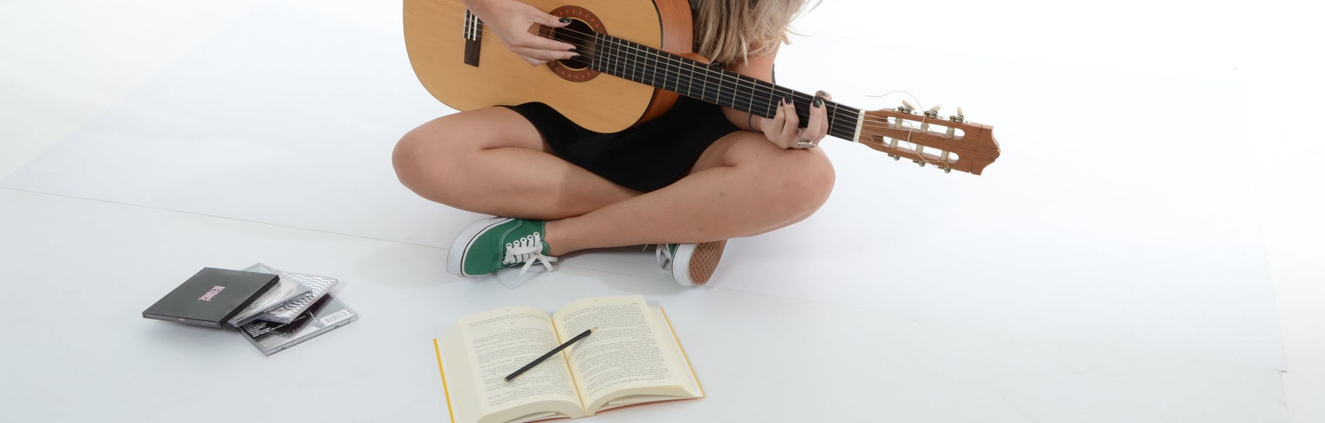 girl playing guitar 