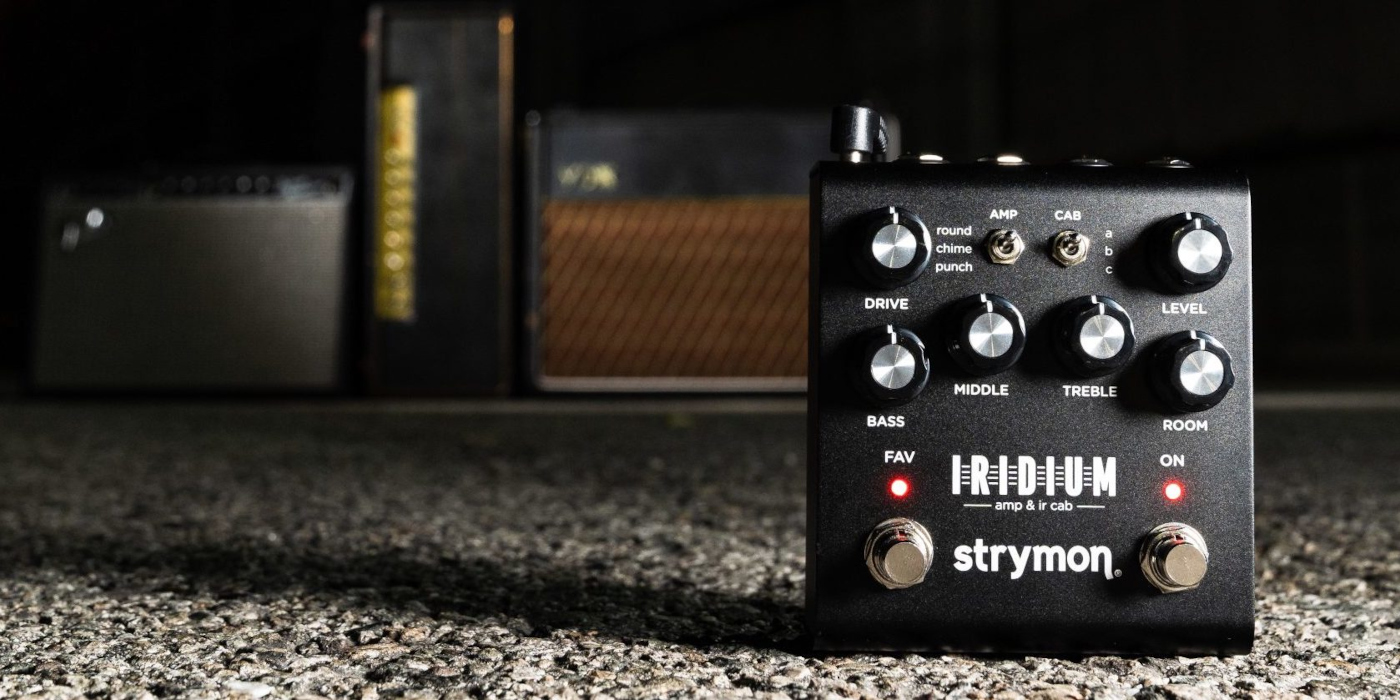 A lifestyle photo of a Strymon Iridium amp and IR cab simulator pedal, a type of ampless guitar rig