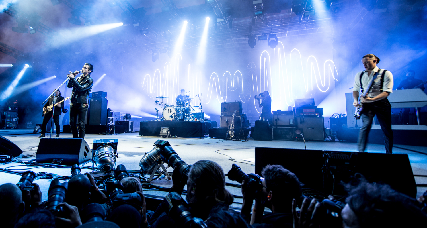Arctic Monkeys on stage at festival