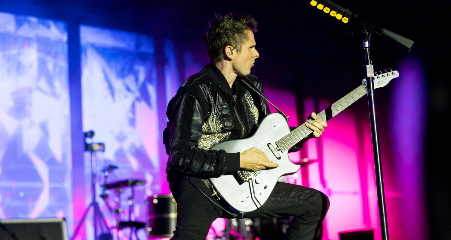 Muse's Matt Bellamy on stage with Manson Guitar