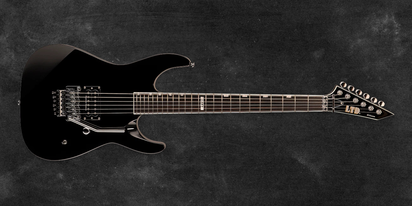The ESP LTD M-1 Custom '87 electric guitar in black against a textured grey background