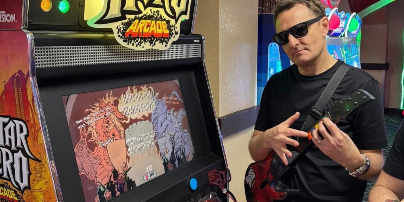 A photo of Lee Anderton playing guitar hero at NAMM Show 2026