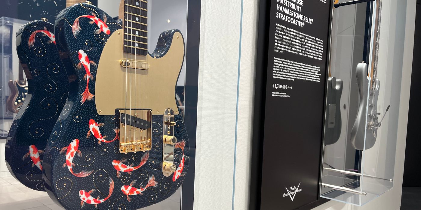 A close up photo of a Fender Masterbuilt Custom Shop Koi Telecaster on display at the Fender Flagship Tokyo store