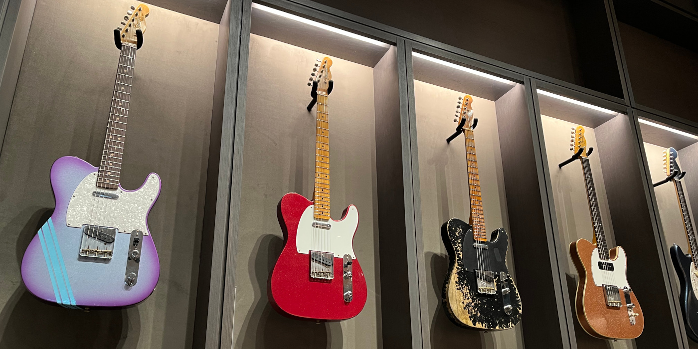 Four Fender Custom Shop Telecaster guitars on display at the Fender Flagship store in Tokyo