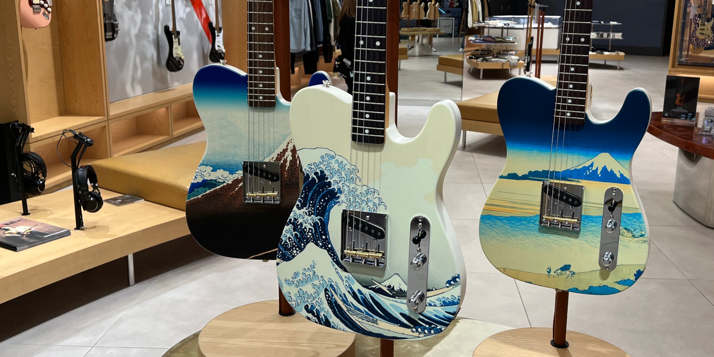 Three Fender Japan exclusive Esquire guitars with Hokusai artwork on display on floor one in the Fender Flagship store in Tokyo