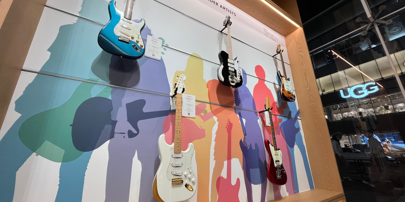 Various Fender artist guitars on display on floor one in the Fender Tokyo store