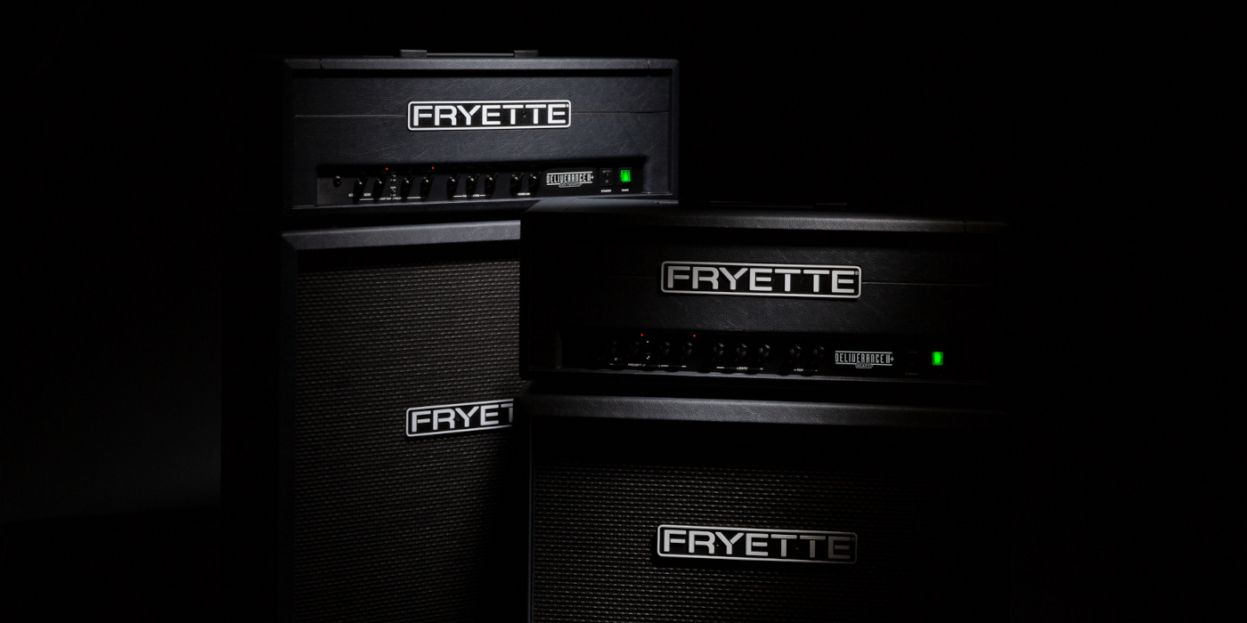 A pair of Fryette Deliverance amp half stacks next to each other against a moody black background