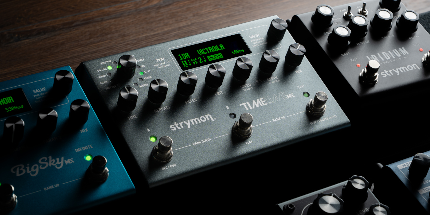 The Strymon Timeline MX delay pedal on a pedalboard next to other Strymon pedals