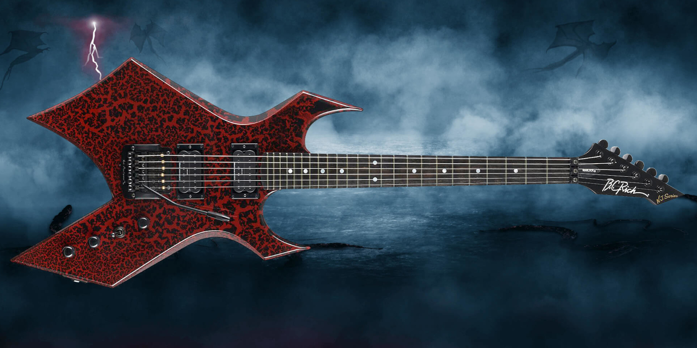 The B.C. Rich x Stranger Things Eddie’s Warlock guitar with a dark, moody Upside Down background