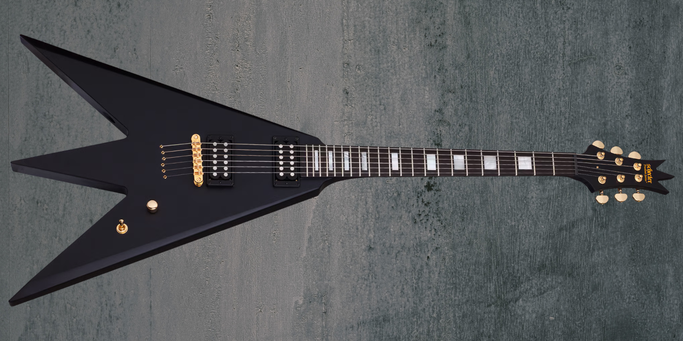 The Schecter Al Jourgensen Triton guitar on a grey textured background